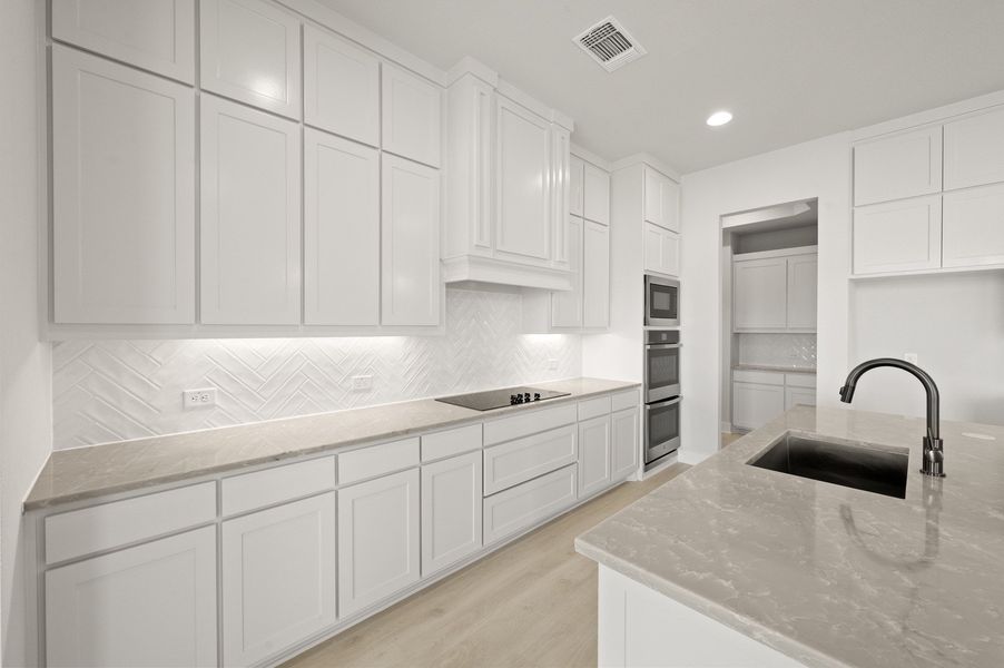 Furnished interior view inside a new home in Byrum Ranch - 1 Acre Lots, Maypearl (Image 9).