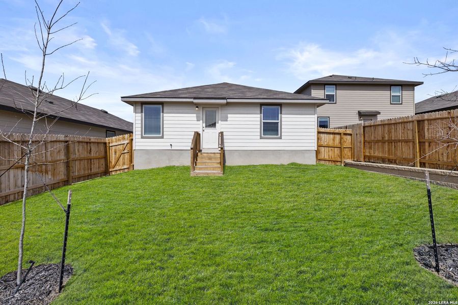 Exterior details and patio area of a home in Stonehill, San Antonio (Image 2).