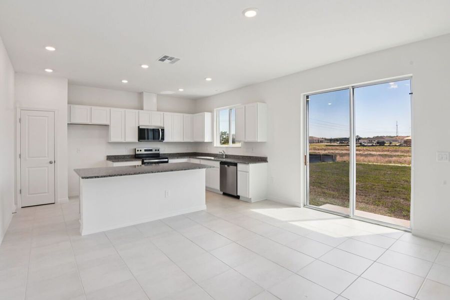 Furnished interior view inside a new home in The Preserve at Legends Pointe II, Hudson (Image 3).
