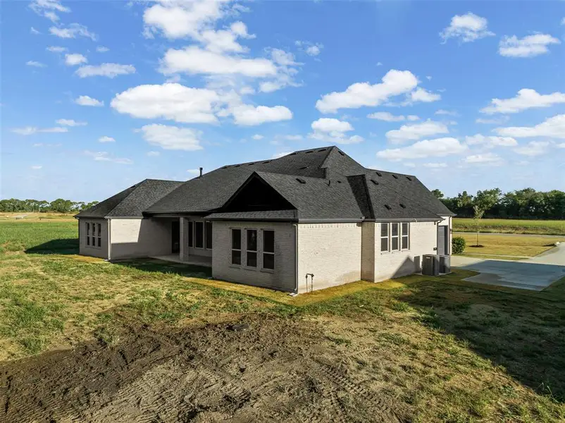 Exterior details and patio area of a home in Waterfall Ranch - 1 Acre Lots, Waxahachie (Image 4). Exterior details and patio area of a home in Waterfall Ranch - 1 Acre Lots, Waxahachie (Image 4).