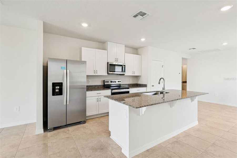 Furnished interior view inside a new home in Springs at Lake Alfred - Classic Series, Lake Alfred (Image 10).