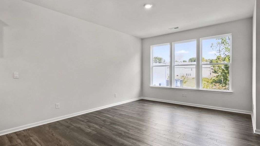 Spacious, unfurnished interior of a new home in The Gables at Edinborough Townes, Gibsonville (Image 12).