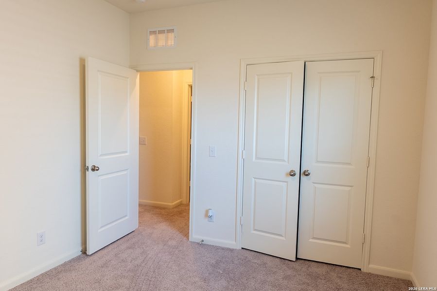 Spacious, unfurnished interior of a new home in Trails at Culebra, San Antonio (Image 20).