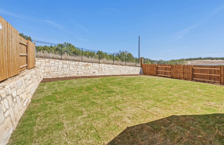 Exterior details and patio area of a home in West Cypress Hills, Spicewood (Image 26). Exterior details and patio area of a home in West Cypress Hills, Spicewood (Image 26).