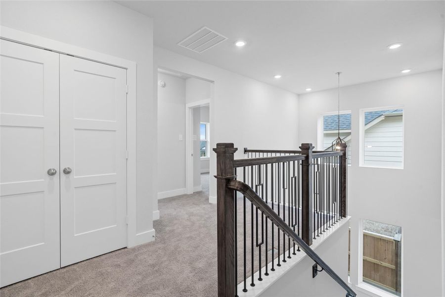 Head upstairs and enjoy the ample natural lighting from the high ceilings and entryway -- spacious secondary bedrooms and bathroom for family and guests.
