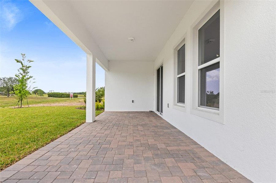 Exterior details and patio area of a home in Gray Hawk at Hole Two, Daytona Beach (Image 40). Exterior details and patio area of a home in Gray Hawk at Hole Two, Daytona Beach (Image 40).