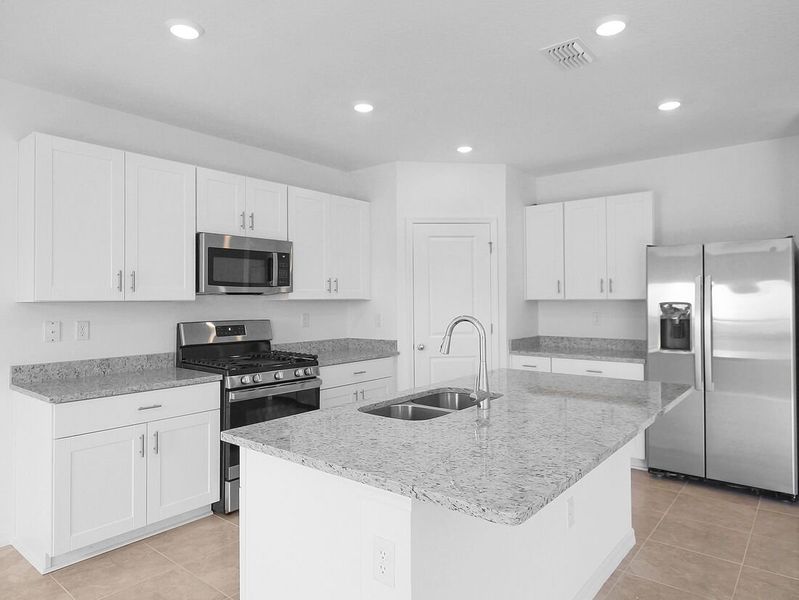 Representative furnished interior of a home built from the Azalea by Taylor Morrison in Waterstone, Groveland (Image 33).