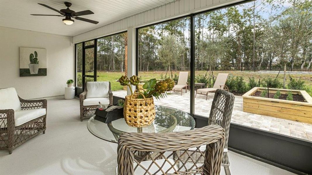Exterior details and patio area of a home in Sawmill Branch Express, Palm Coast (Image 3).