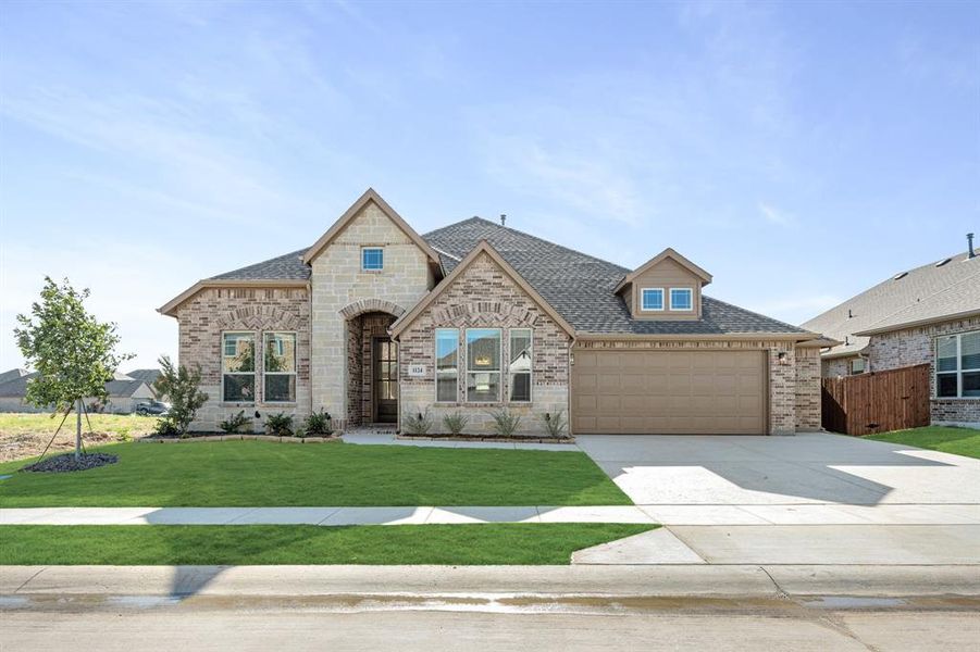 Front exterior of a new home in Timberbrook 3B-4A, Justin, TX, highlighting curb appeal (Image 24).