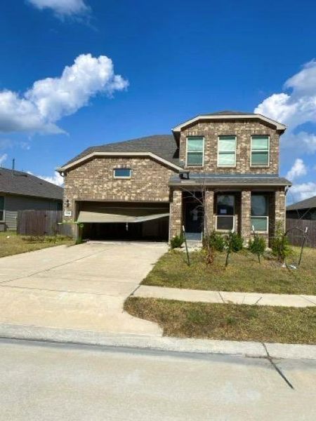 Front exterior of a new home in Myrtle Gardens, Magnolia, TX, highlighting curb appeal (Image 19). Front exterior of a new home in Myrtle Gardens, Magnolia, TX, highlighting curb appeal (Image 19).