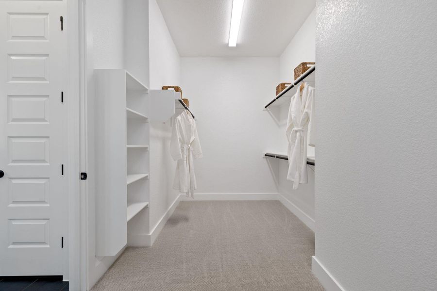 Walk-in closet in Primary Bedroom - Representative Photo