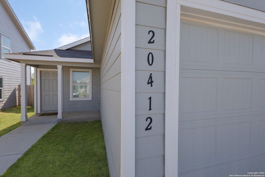 Exterior details and patio area of a home in Ruby Crossing: Cottage Collection, San Antonio (Image 3).