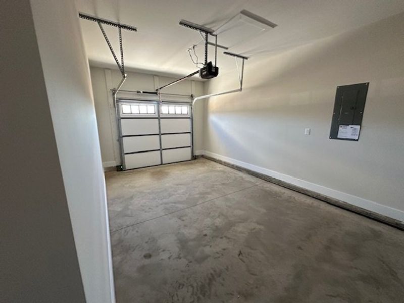 This spacious garage offers convenience and ample