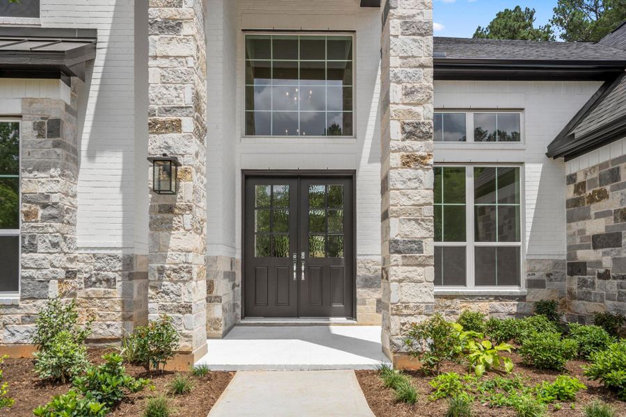 Exterior details and patio area of a home in The Woodlands Hills, Willis (Image 3). Exterior details and patio area of a home in The Woodlands Hills, Willis (Image 3).