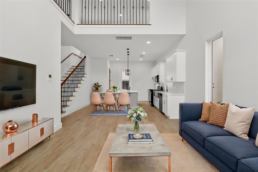 1067-Family Room Virtually Staged. Living and Dinning Combo with open Kitchen.