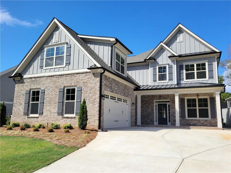 Front exterior of a new home in , Jefferson, GA, highlighting curb appeal (Image 2).