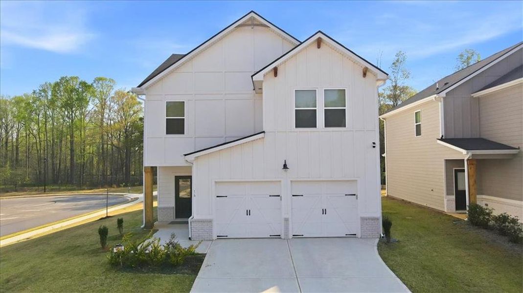 Front exterior of a new home in , McDonough, GA, highlighting curb appeal (Image 24).