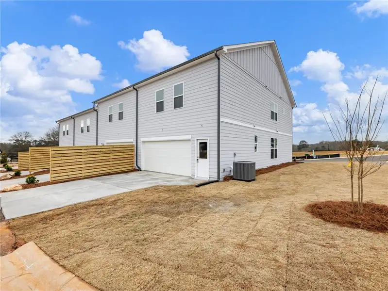 Exterior details and patio area of a home in Apalachee Overlook, Winder (Image 3).