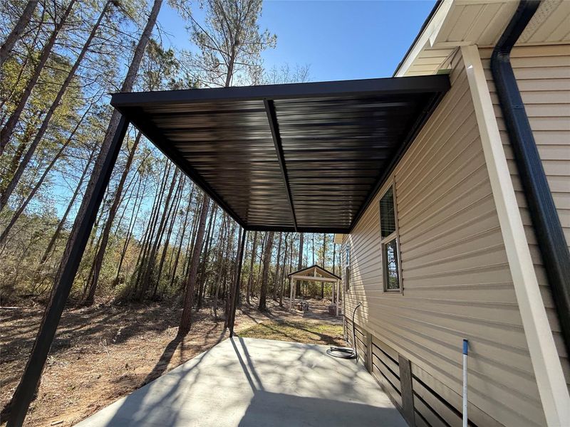 Exterior details and patio area of a home in , Plantersville (Image 24). Exterior details and patio area of a home in , Plantersville (Image 24).