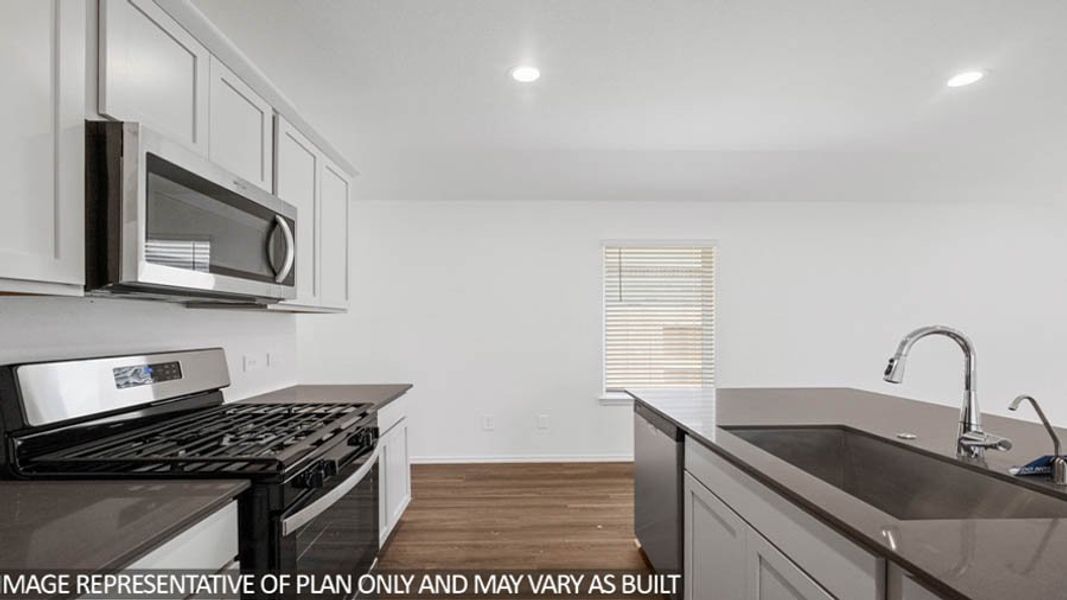Furnished interior view inside a new home in Sunterra, Katy (Image 5).