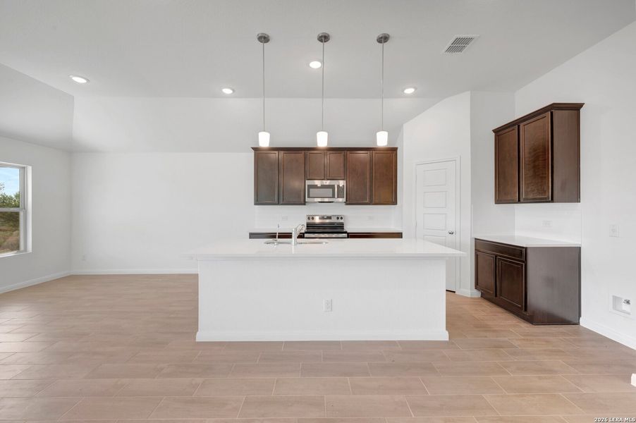 Furnished interior view inside a new home in Chaparral Ranch, Floresville (Image 9).