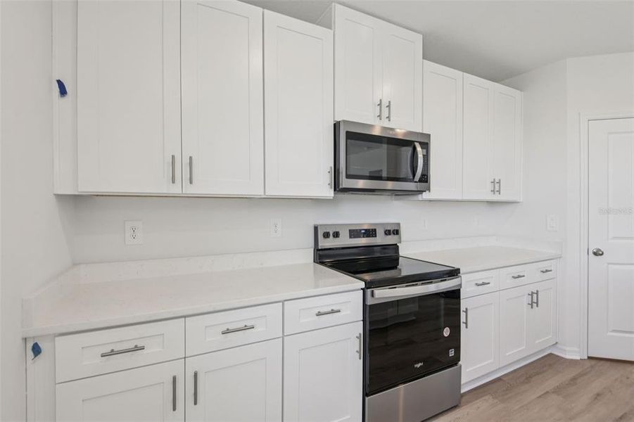 Furnished interior view inside a new home in Hilltop Vistas, Dade City (Image 13).