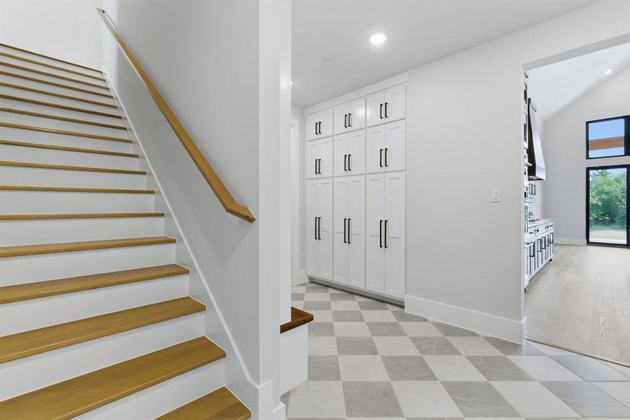 Stairway to the Spacious Upstairs Gameroom