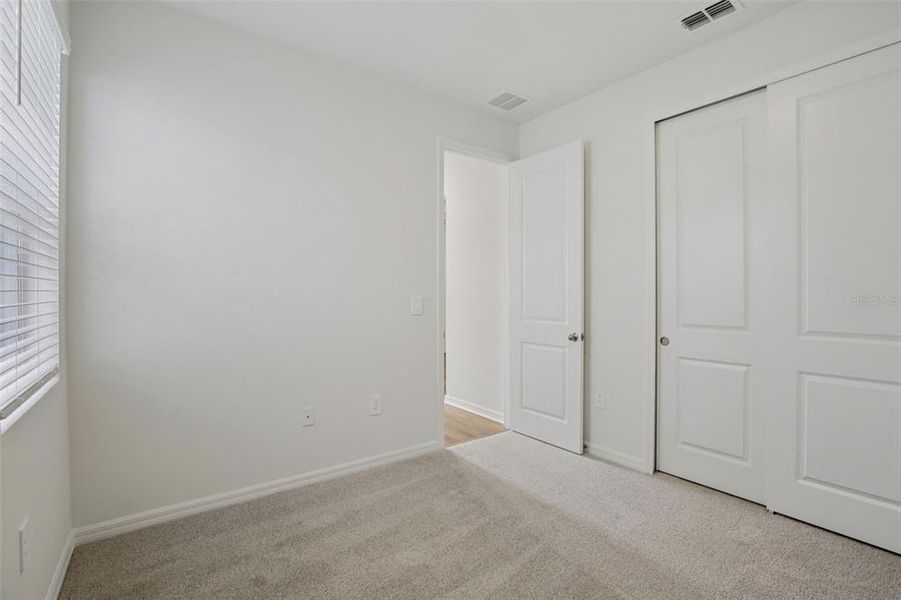 Spacious, unfurnished interior of a new home in Coasterra - Reserve Series, Palmetto (Image 30).