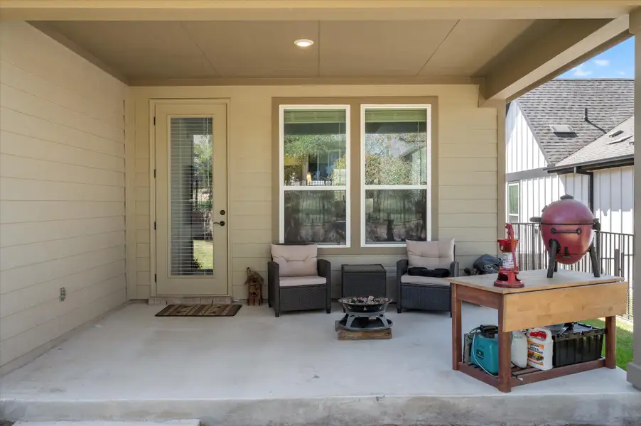 View of patio / terrace with an outdoor living space with a fire pit View of patio / terrace with an outdoor living space with a fire pit