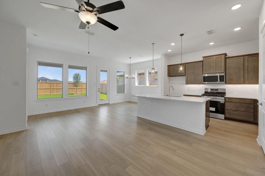 Spacious, unfurnished interior of a new home in Meridiana - Terrace Collection, Manvel (Image 14).