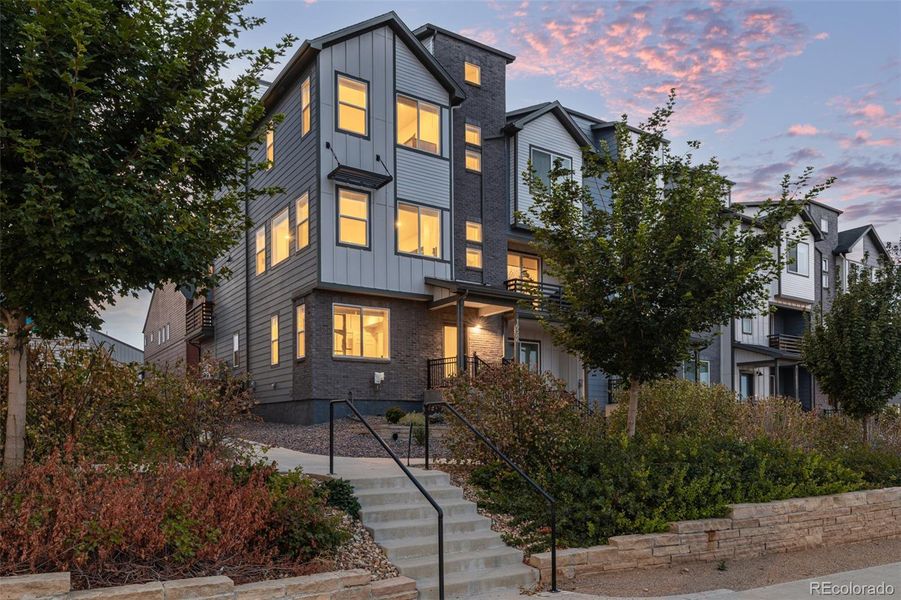 Front exterior of a new home in , Broomfield, CO, highlighting curb appeal (Image 20).