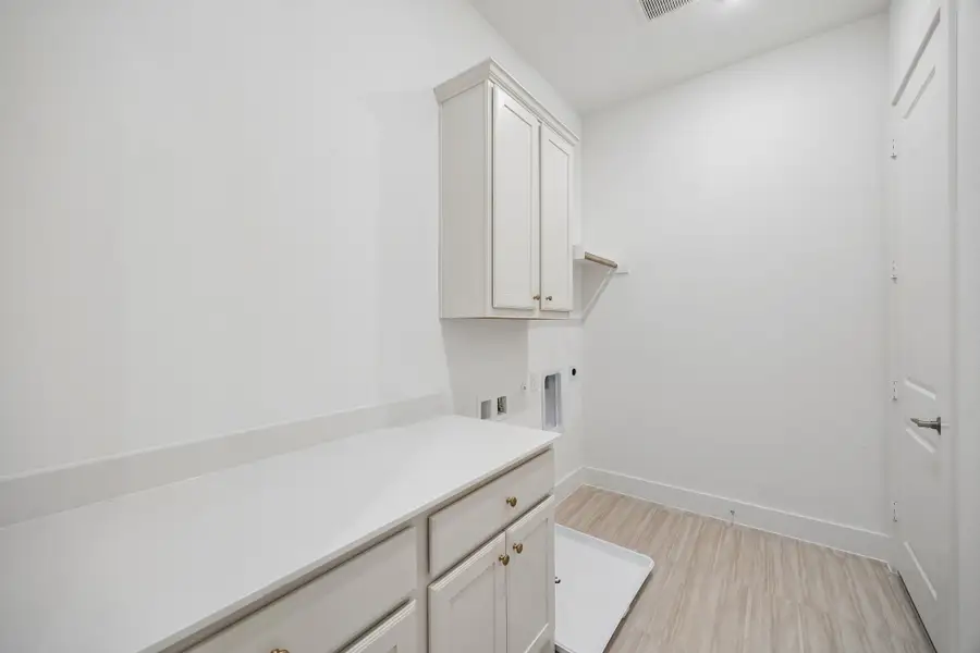 Furnished interior view inside a new home in Newman Village Townhomes, Frisco (Image 9).
