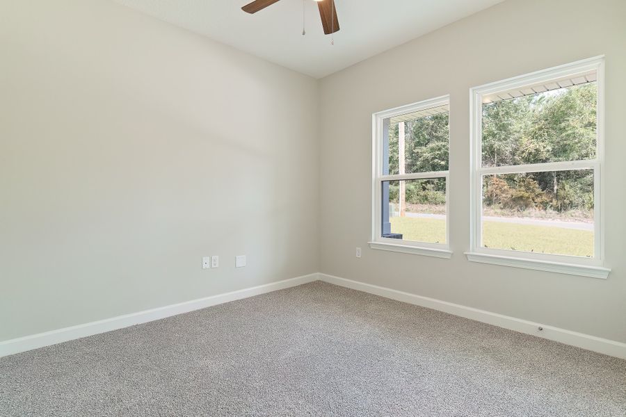 Representative unfurnished interior of a home built from the Maybell III by CJL Homes in Barton's Bend, Crestview (Image 19).