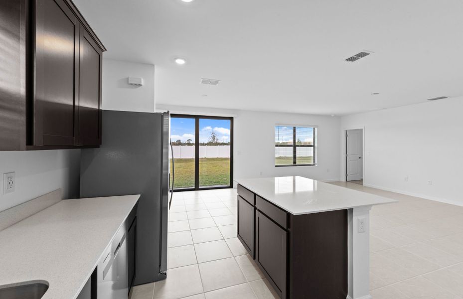 Furnished interior view inside a new home in Caloosa Cove, Labelle (Image 4).