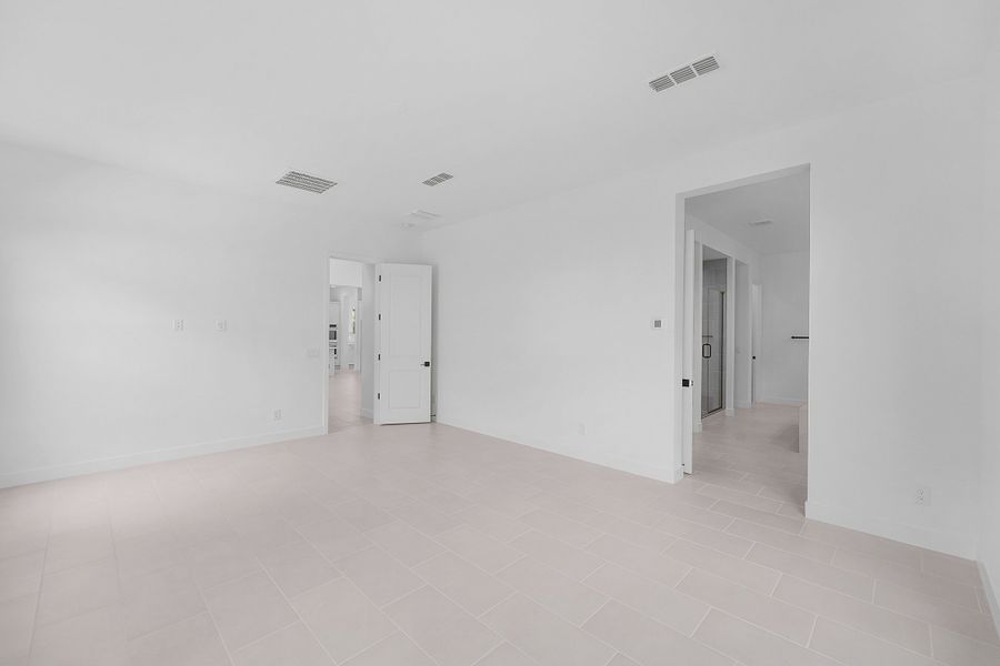 Spacious, unfurnished interior of a new home in Ellsworth Ranch Voyage Collection, Queen Creek (Image 25).