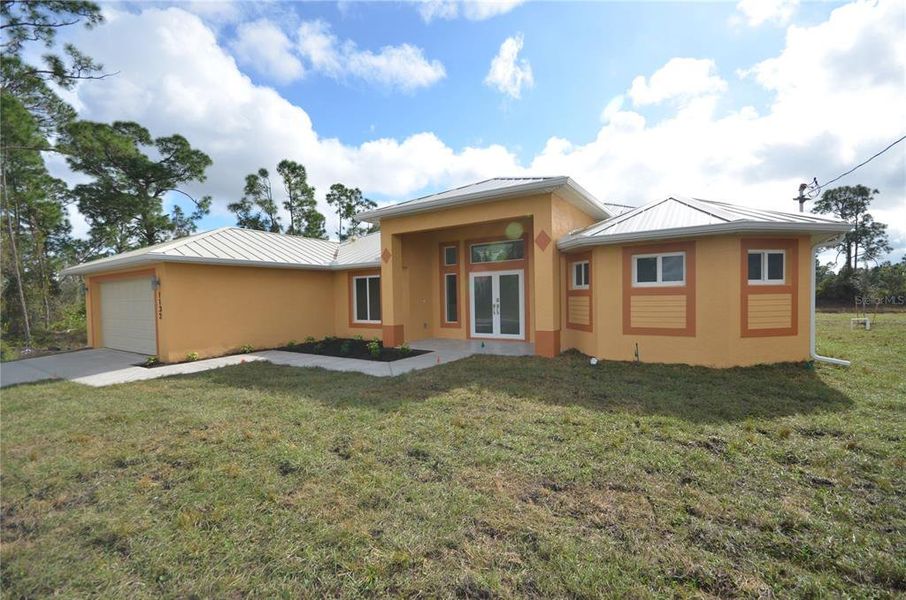 Exterior details and patio area of a home in , Lehigh Acres (Image 13).