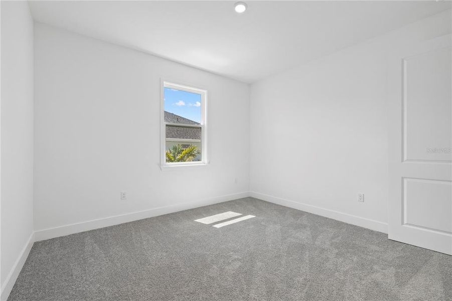 Spacious, unfurnished interior of a new home in , Punta Gorda (Image 11).