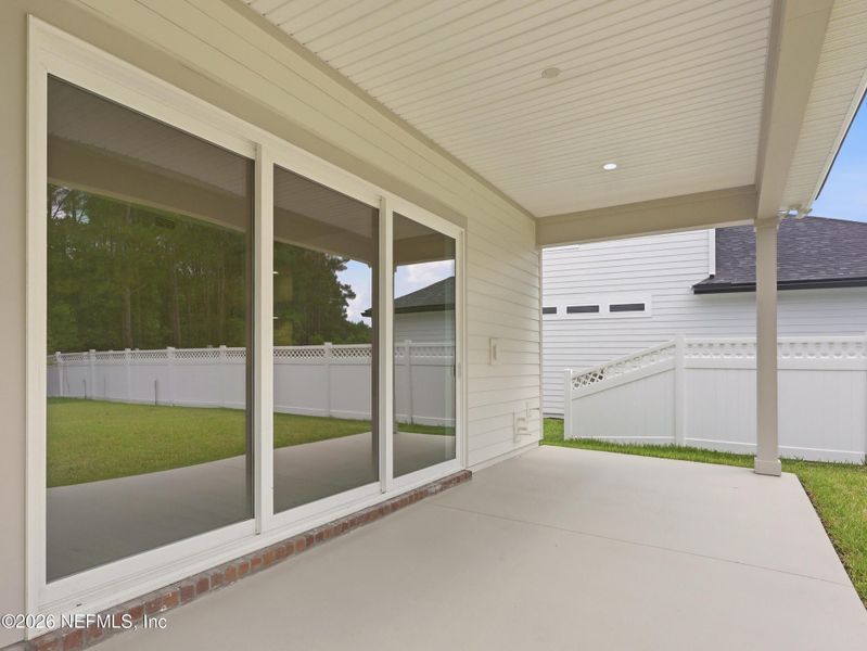 Exterior details and patio area of a home in Silver Landing At Silverleaf, St. Augustine (Image 36).