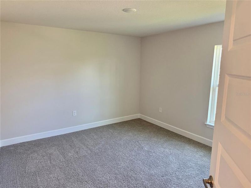 Spacious, unfurnished interior of a new home in , Port Charlotte (Image 19).