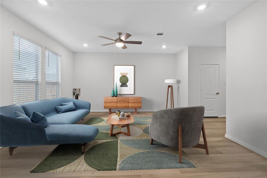 Gather the family and guests together in your lovely family room! Featuring high ceilings, recessed lighting, ceiling fan, custom paint, gorgeous vinyl plank floors and large windows that provide plenty of natural lighting throughout the day.