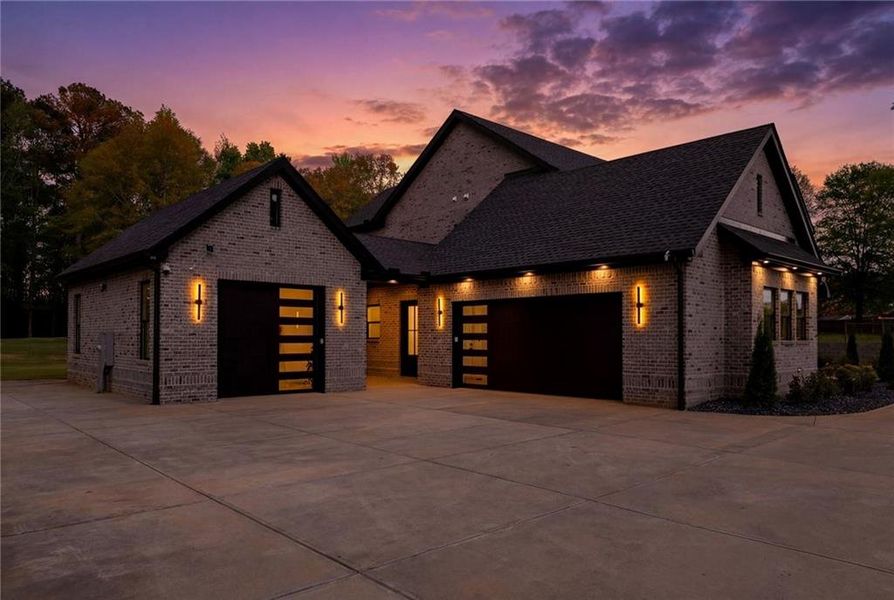 Front exterior of a new home in , Monroe, GA, highlighting curb appeal (Image 26). Front exterior of a new home in , Monroe, GA, highlighting curb appeal (Image 26).