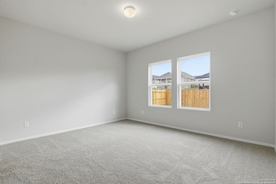 Spacious, unfurnished interior of a new home in Hunters Ranch, San Antonio (Image 38).