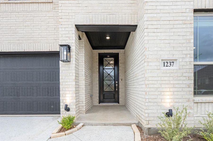 Exterior details and patio area of a home in Star Ranch, Godley (Image 20).
