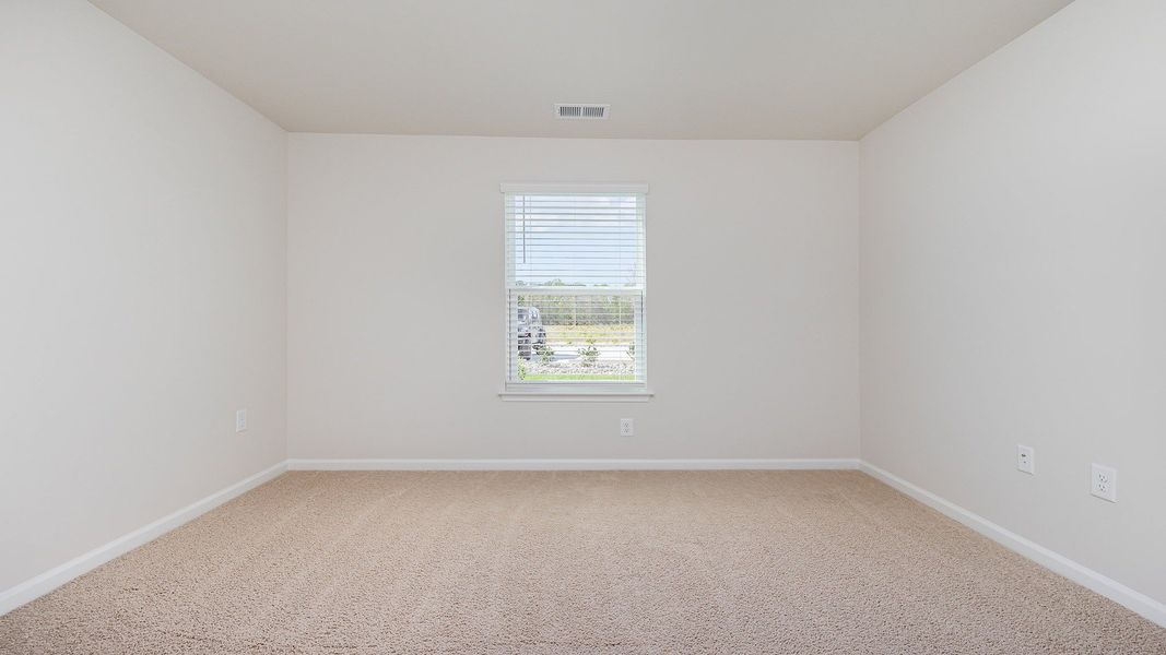 Spacious, unfurnished interior of a new home in The Meadows at Wildwood Village, Shallotte (Image 19).