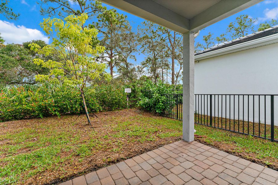 Exterior details and patio area of a home in Banyan Bay, Stuart (Image 40).