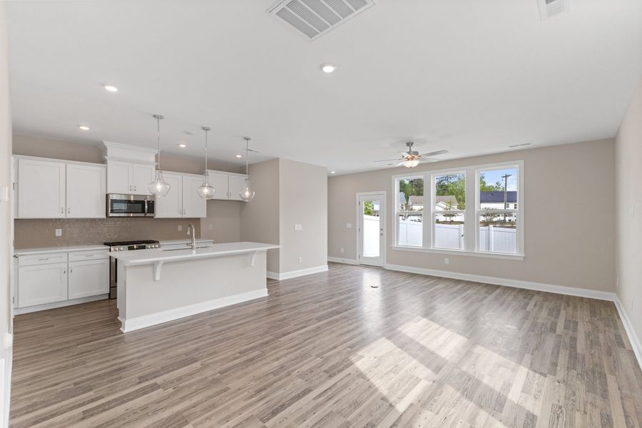Representative unfurnished interior of a home built from the The Juniper by RobuckHomes in Kennebec Crossing, Angier (Image 92).