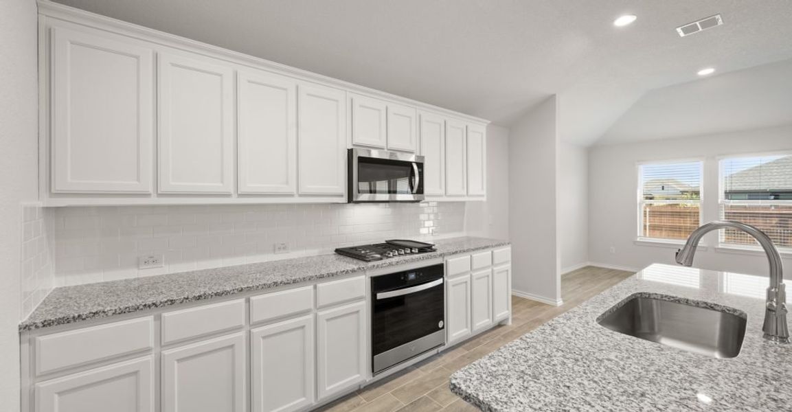 Representative exterior photo of a completed home built from the Cromwell II by Impression Homes in Stone Eagle, Azle, TX (Image 10).