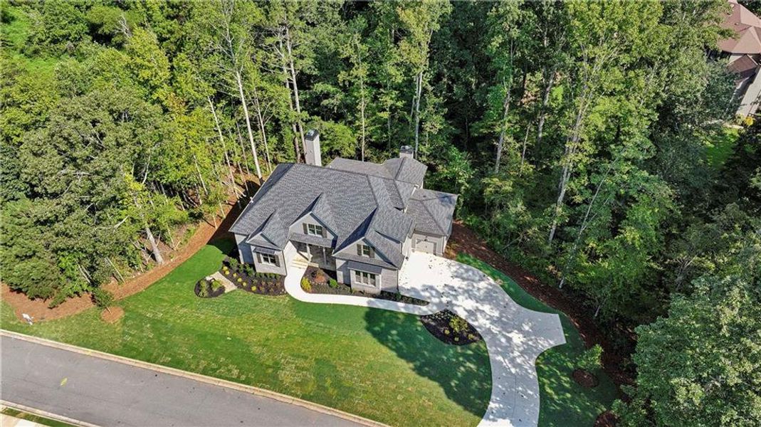 Front exterior of a new home in , Cumming, GA, highlighting curb appeal (Image 23). Front exterior of a new home in , Cumming, GA, highlighting curb appeal (Image 23).