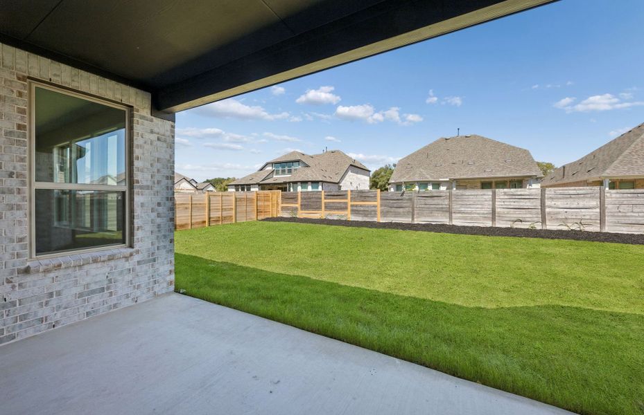 Exterior details and patio area of a home in Bluffview Reserve, Leander (Image 30).