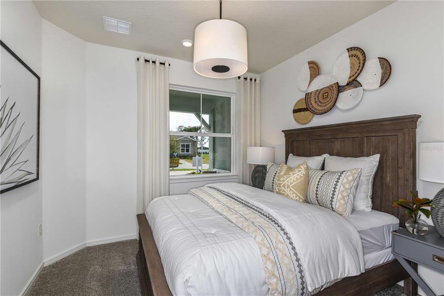 Furnished interior view inside a new home in Del Webb Sunbridge, St. Cloud (Image 19).